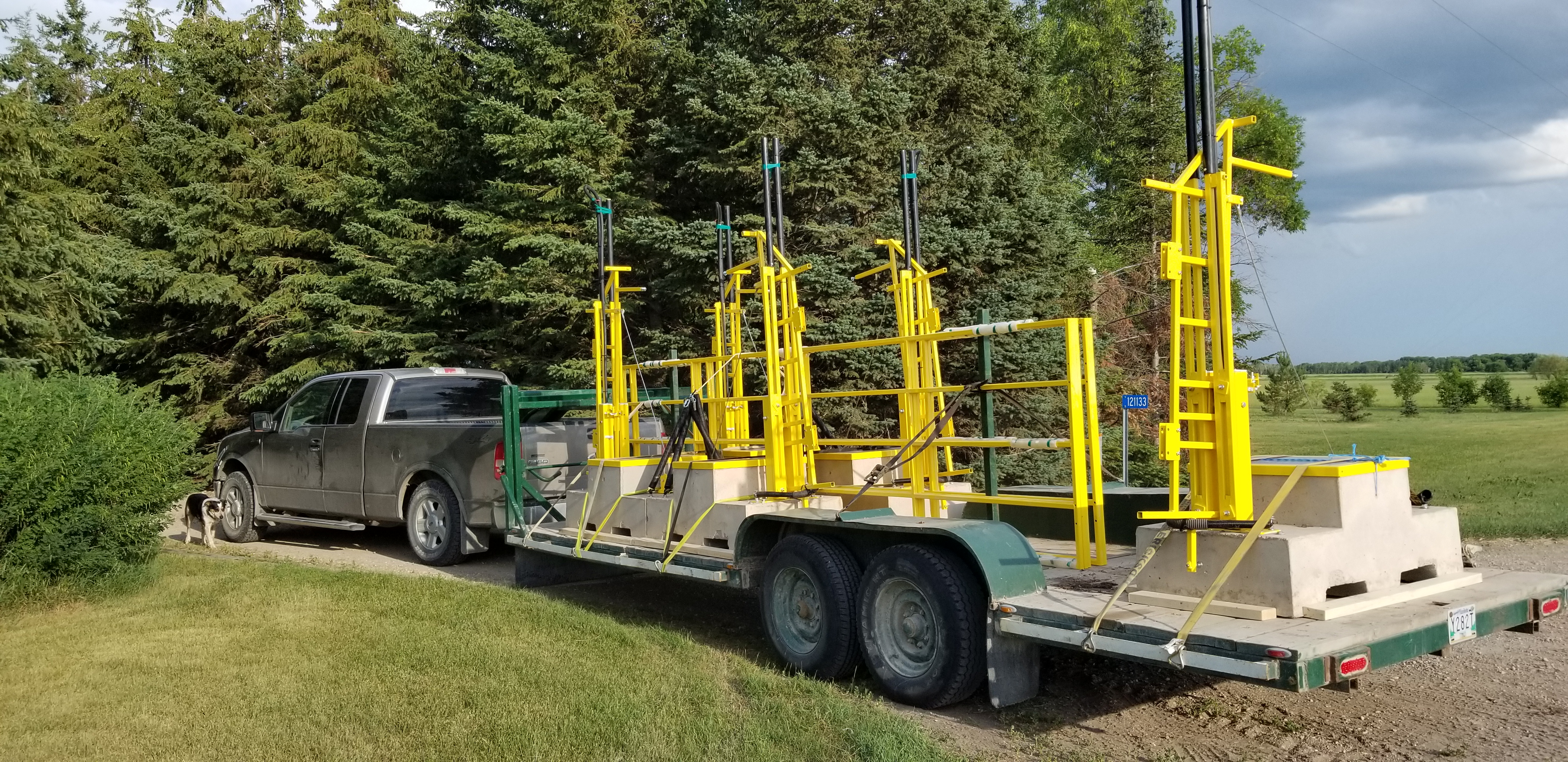 Five MJ Endeavors solar lift gates on a trailer for a Sask Power generating station project.